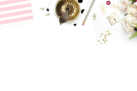 Table view woman items, white background mock up, woman desk. Flat lay. Still life. Gold Frame. Mock-up.の写真素材