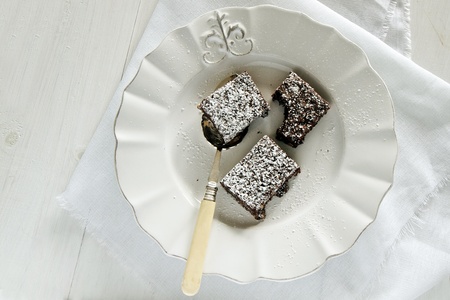 Delicious chocolate brownies on white plate の写真素材