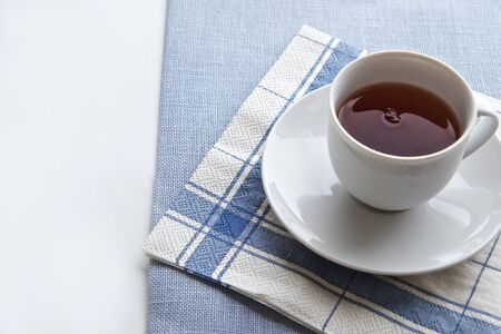 Tea time , teacup wth linen cloth and servietteの写真素材