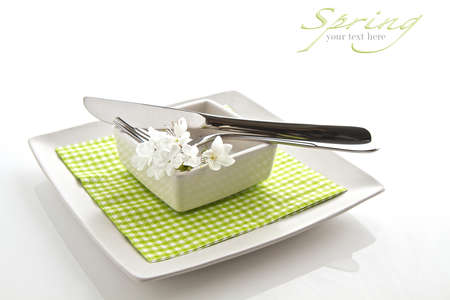 Spring table setting isolated on white with space for textの写真素材