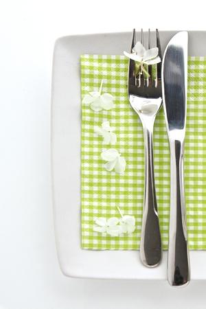 Spring table place setting with knife and forkの写真素材
