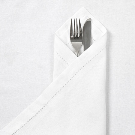 Knife and fork with linen servietteの写真素材