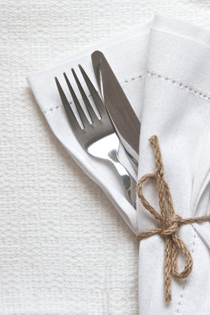 White linen napkin and cutlery の写真素材