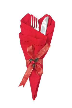 Knife and fork wrapped with a red napkin  for Christmasの写真素材