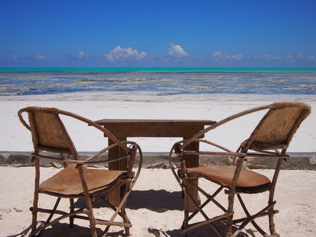 Sitting on the beachの写真素材