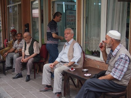 Istanbul, Turkey - September 28, 2015: A group of elderly men sit ourside a cafe drinking their Turkish tea in the Balat district of Istanbul.のeditorial素材