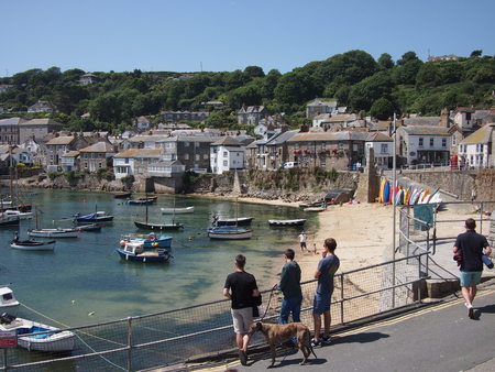 Mousehole, Cornwall, UK - July 11, 2015: A small harbour in the Cornwish village of Mousehole in the summerのeditorial素材