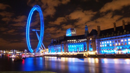 London, UK - February 21, 2014: The River Thames and south bank illuminated on a cold winter's nightの写真素材