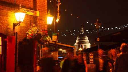 London, UK - July 9, 2013: St Paul's Cathedral viewed from from a busy pub on the southbankDescriptionのeditorial素材