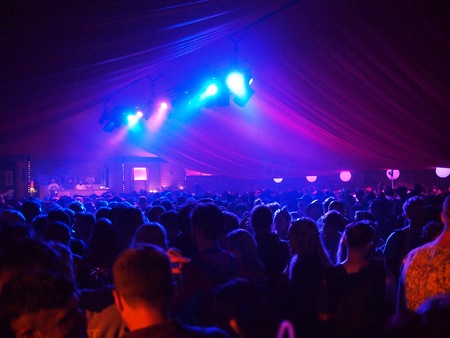 Pilton, United Kingdom - June 25, 2015: Crowd dance at a music festival at nightのeditorial素材