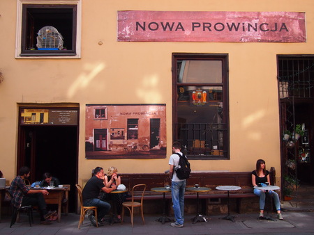 Krakow, Poland - June 04, 2016: People relaxing in a cafe in the sunshine in Krakowのeditorial素材