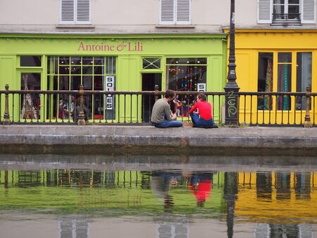 Paris, France - June 28, 2016: Colourful cafes on Canal St. Martin in Parisのeditorial素材