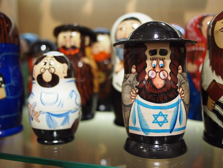 A Rabbi and family as traditional Jewish Russian dollsの写真素材