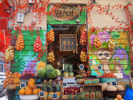 Tel Aviv, Israel - 07 June, 2017: A woman working at her colourful fruit smoothie shopのeditorial素材