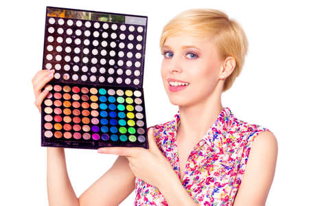 Artis with makeup brushes and palette of eyeshadowsの写真素材