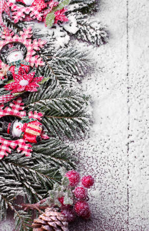 Spruce Christmas decoration sprinkled with snowの写真素材