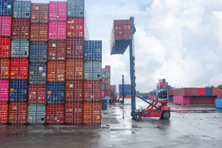 Container lifting work in a boat after the rainのeditorial素材