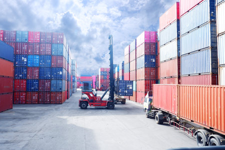 Container. Industrial crane loading Containers in a Cargo freight ship. Container ship in import and...