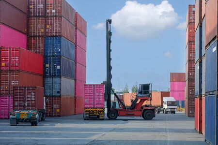 Container stacker, load the container into the truck. Transportation conceptのeditorial素材