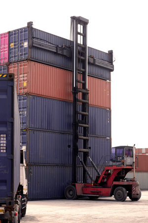 Container. Industrial crane loading Containers in a Cargo freight ship. Container ship in import and...
