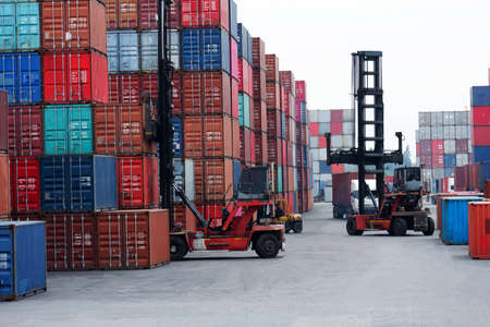 Container forklift in view of container yard industryの写真素材