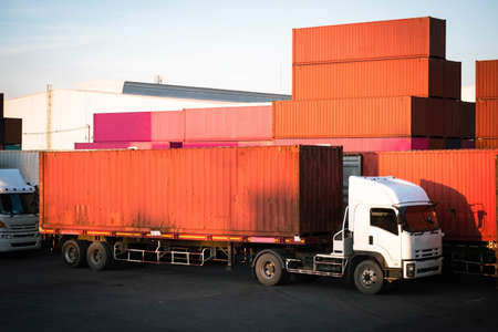Truck in container yard view of import and exportの写真素材