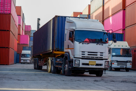 Trucks in the container depot Focus on imports and exportsの写真素材