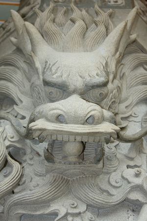 Dragon head carving near the Big Buddha in Hong Kongの写真素材