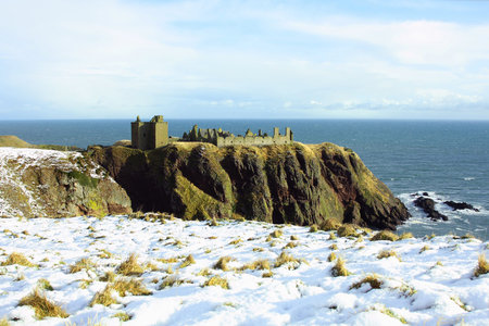 Dunnottar Castle with snow on the ground, Scotlandの写真素材