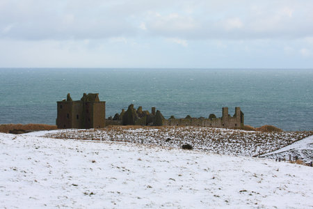 Dunnottar Castle with snow on the ground, Scotlandの写真素材