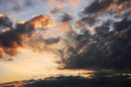 The effects of the sunset reflected on the autumn skyの写真素材