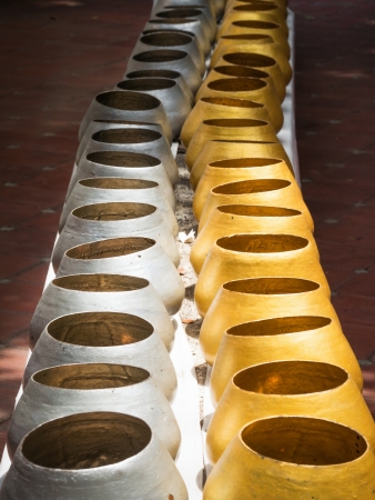 gold and silver color alms bowl の写真素材