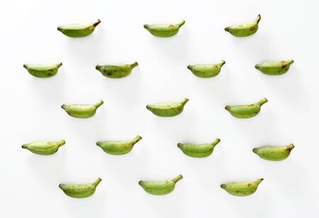 Seamless pattern with green bananas isolated on white background.の写真素材