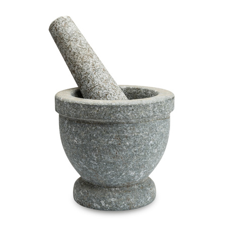 Stone mortar with pestle isolated on white background.の写真素材