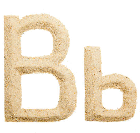 sand alphabet isolatedの写真素材