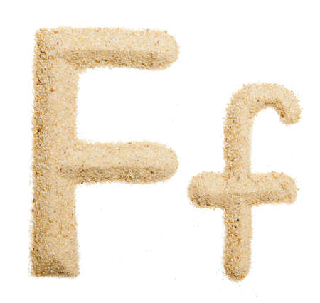 sand alphabet isolatedの写真素材