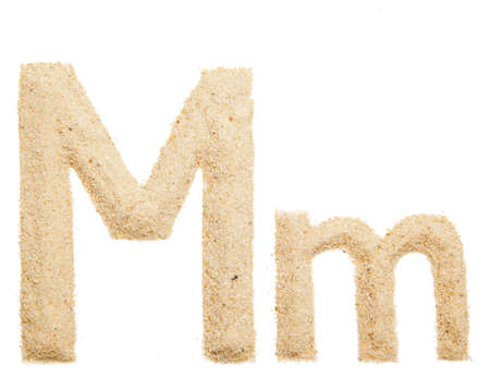 sand alphabet isolatedの写真素材