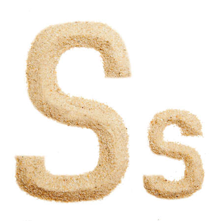 sand alphabet isolatedの写真素材