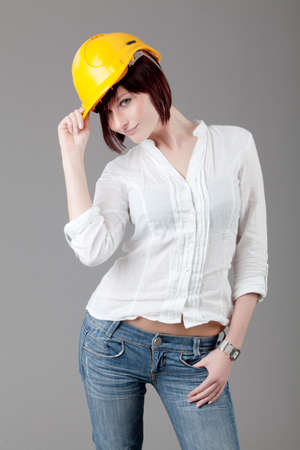 attractive smiling woman. Portrait of an attractive young woman.  lady posing on grey background.の写真素材