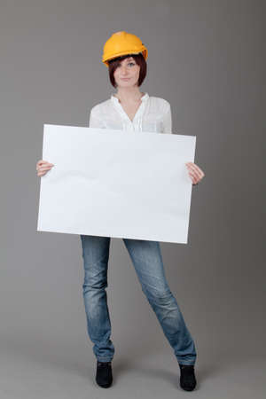 attractive smiling woman. Portrait of an attractive young woman.  lady posing on grey background.の写真素材