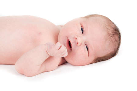 one week old baby boy on white の写真素材
