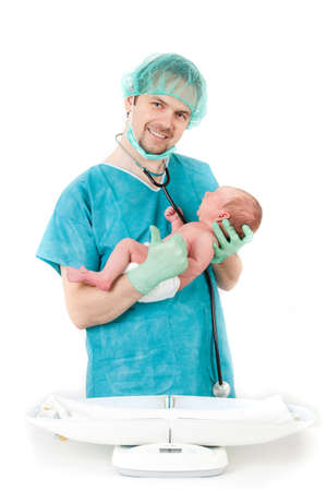 doctor and baby on a white background  Little baby on scales の写真素材