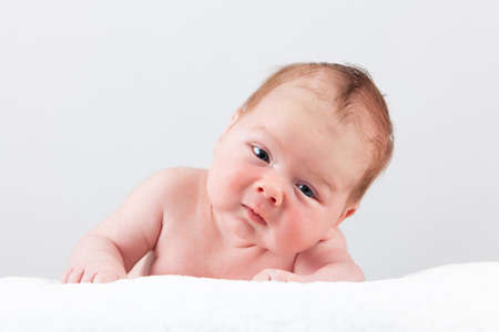 portrait of adorable baby. beautiful baby boy on white background.  1 month baby.の写真素材
