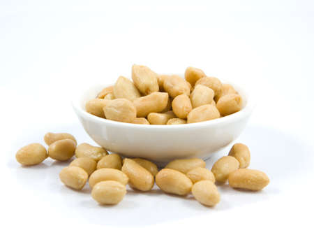 Salted peanuts. Nuts in a Small Bowlの写真素材