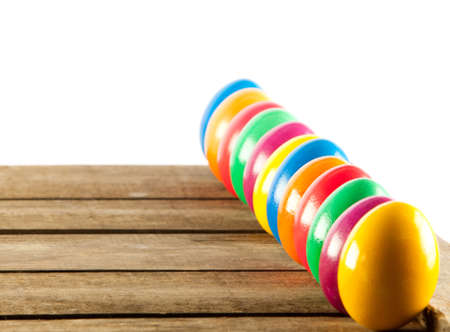 Colorful easter eggs on old wooden background  Easter concept  The colorful painted Easter eggsの写真素材