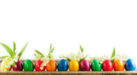 Colorful easter eggs on old wooden background  Easter concept  The colorful painted Easter eggs