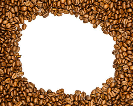 Frame made from roasted coffee beans over white background.の写真素材