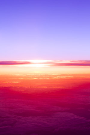 sunset above clouds  View of sunset from airplane window