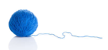Blue wool yarn ball isolated on whiteの写真素材