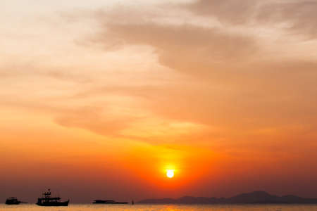 sunset boat in Thailand. Fishing boat sunriseの写真素材